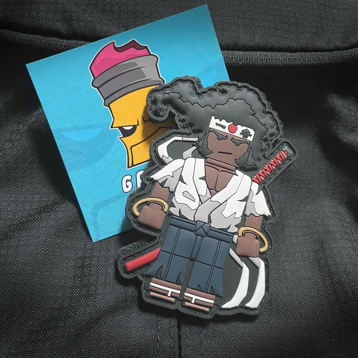 Grumpy Brick fig "afro" Pvc Patch